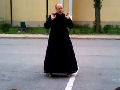 Skateboarding Priest